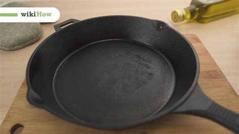 how long to cure cast iron in oven