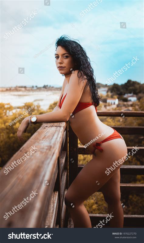 Sexy Woman Red Bikini Looking Camera Shutterstock
