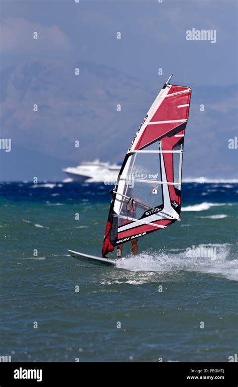 Windsurfing On A Windy Day Stock Photo Alamy