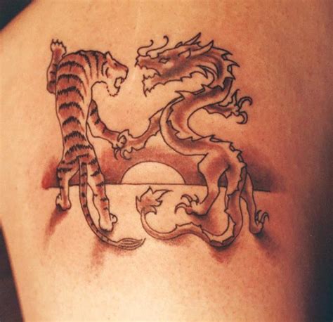 top tattoo designs: Dragon Phoenix Tattoo