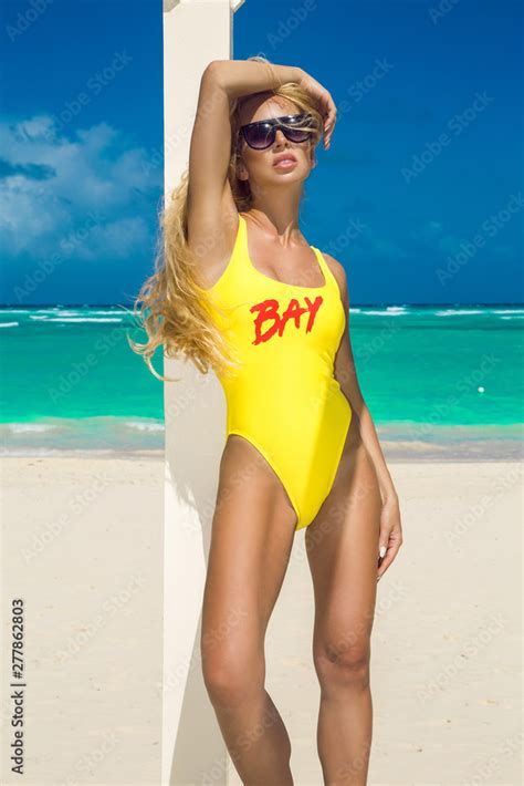 Incredibly Beautiful Sexy Model Girl In Bikini At The Seaside Of The Tropical Island Blonde