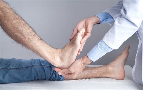 Premium Photo Caucasian Doctor Examining Patient Foot