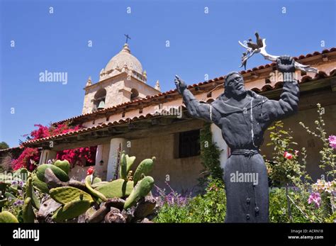 Statue of St Francis in courtyard at Mission San Carlos Borromeo del ...