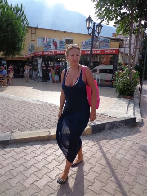 Blonde Milf Lifting Her Dress To Expose Shaved Pussy Pics XHamster