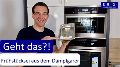 A Man Holding An Open Dishwasher In Front Of His Face With The Words