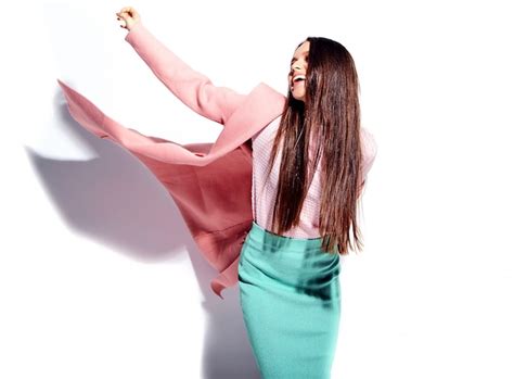 Free Photo Portrait Of Beautiful Caucasian Smiling Brunette Woman Model In Bright Pink