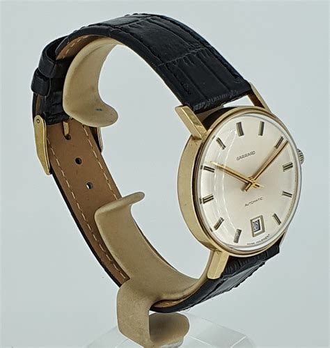 SOLD 1974 1975 Garrard 9k gold automatic - Birth Year Watches