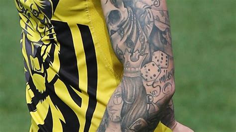 Dustin Martin Tattoos What Tigers Stars Ink Really Means Herald Sun