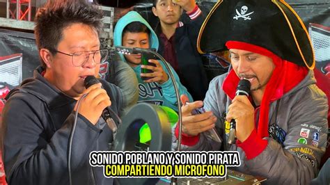 SONIDO EL POBLANO Y SONIDO PIRATA COMPARTIENDO MICROFONO EN UNA CUMBIA