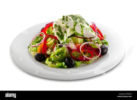 Healthy vegetable salad with white cheese isolated on white background Stock Photo - Alamy