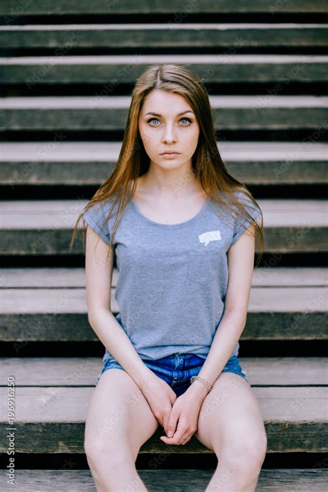 Brunette Teenage Girl With Blue Eyes