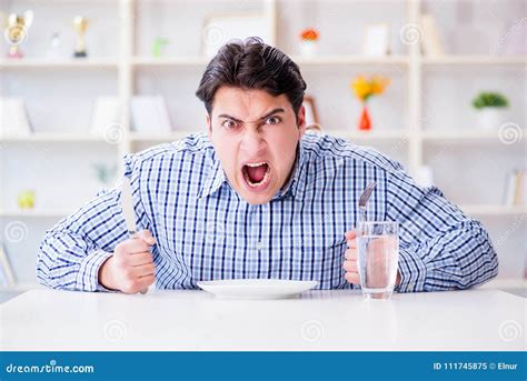 The Man on Diet Waiting for Food in Restaurant Stock Image - Image of aggressive, glass: 111745875