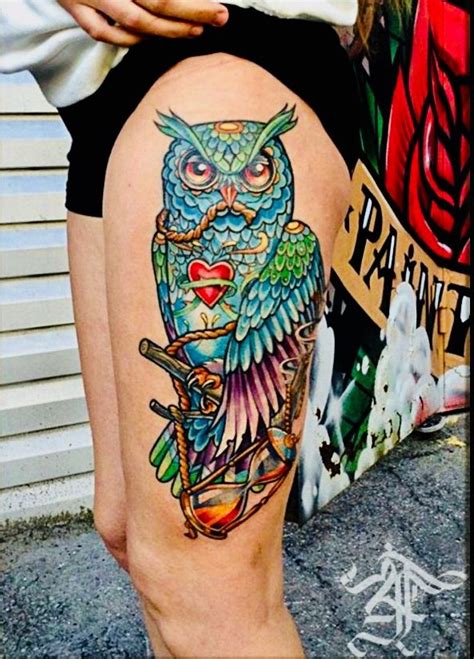 COLORFUL OWL TATTOO ON THIGH Tattoos Thigh Tattoo Colorful Owl Tattoo