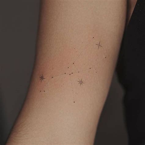 Minimalist Taurus Constellation Tattoo On The Bicep Taurus Tattoos