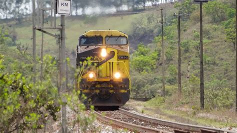 POTÊNCIA MÁXIMA PESADO TREM DE MINÉRIO SUBINDO A FORTE RAMPA NA