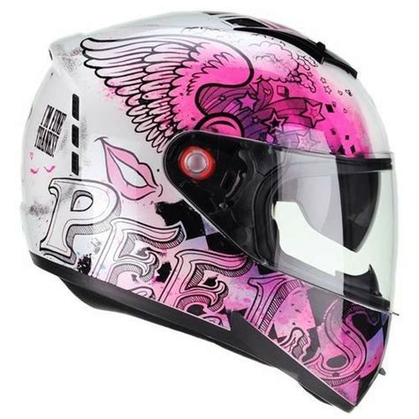 A Helmet With Pink And Black Designs On It