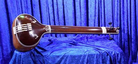 The Tambura A Stringed Instrument Of India Religions Facts