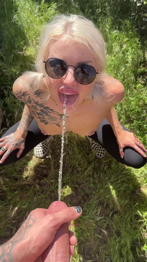 Blonde Squats Down And Receives Guys Piss ThisVid