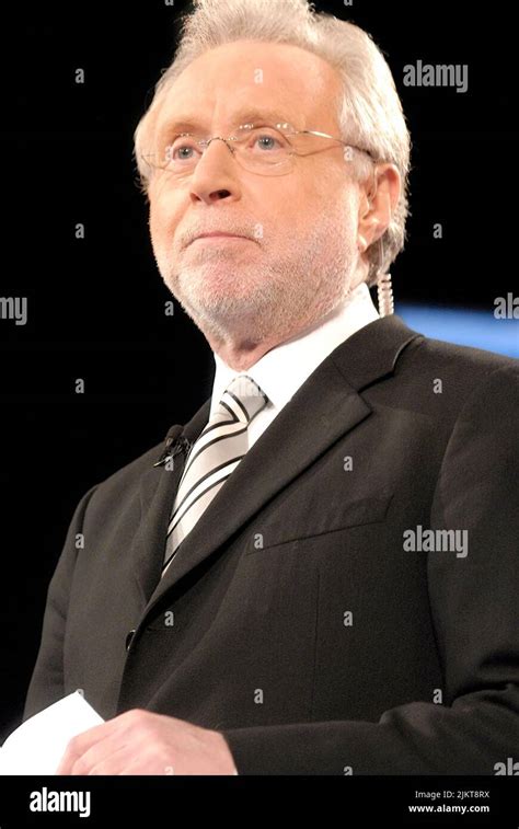 A Vertical Shot Of The Cnn News Anchor Wolf Blitzer Appearing Live