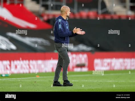 Manchester City Manager Pep Guardiola Appears Dejected After The Final Whistle During The