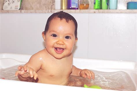 Premium Photo Portrait Of Cute Naked Baby Girl In Bathtub