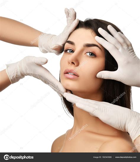 Beautiful Young Woman Face Plastic Surgery And Doctor Hands In Medical