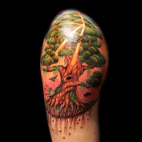 realistic and silhouette trees tattoos done at Masterpiece Tattoo by Brian