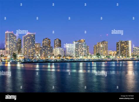 Honolulu city skyline reflection in ocean, Hawaii, United States Stock Photo - Alamy