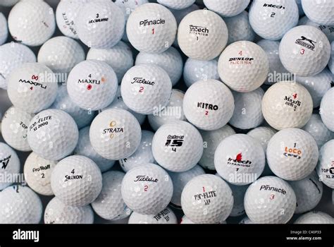 Golf Balls showing variety of logos and brands Stock Photo - Alamy