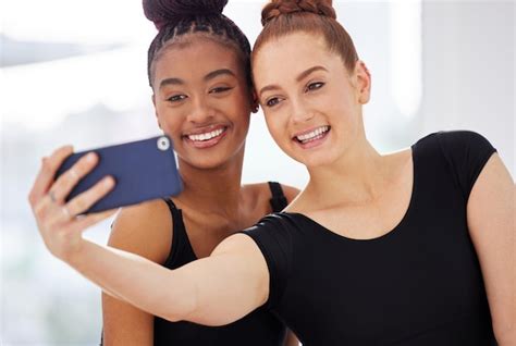 Premium Photo You Have A Beautiful Smile Shot Of Two Ballerinas