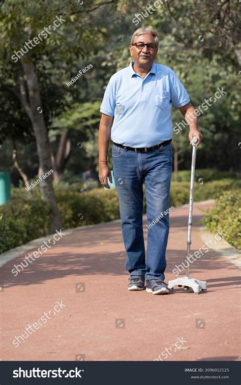 Old Senior Man Holding Walking Stick Stock Photo 2096012125 Shutterstock