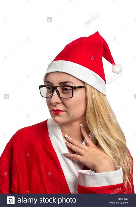 Young Girl In A Santa Suit And Sunglasses On White Background Stock