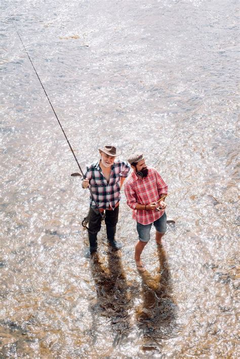 Father And Son Fishing Fly Fishing Is Most Renowned As A Method For