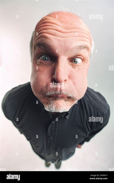 Man pulling funny face hi-res stock photography and images - Alamy