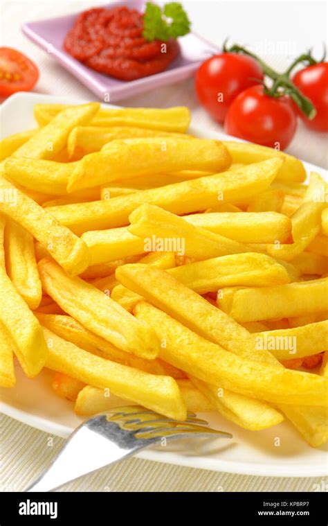 French Fries With Tomato Sauce Stock Photo Alamy