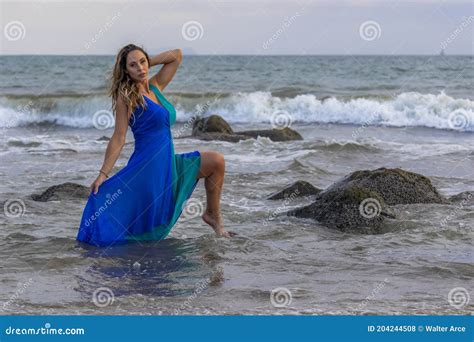 Lovely Brunette Latin Model Poses Outdoors On A Beach At Sunset Stock Photo Image Of Cute