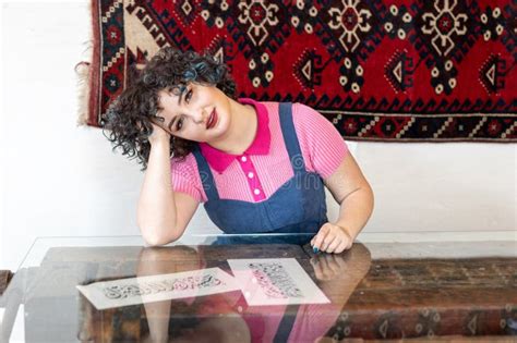 Portrait Of A Smiling Brunette Girl Of Twenty Five Years Old Dressed In A Vintage Pink Blouse
