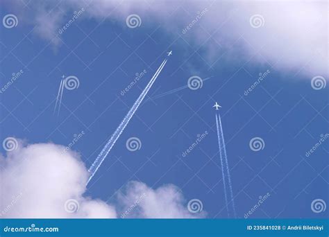 Many Distant Passenger Jet Planes Flying On High Altitude On Clear Blue