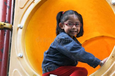 Year Old Latina Girl With Glasses Plays In Park Games Enjoys Weekend On Vacation Stock Photo