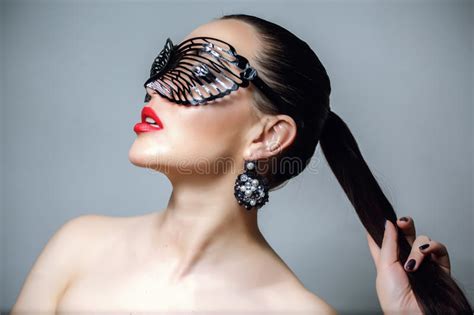 Beautiful Woman With Black Lace Mask Over Her Eyes Red Lips And Nails