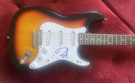 Charitybuzz Dave Grohl Signed Pickguard On Electric Guitar