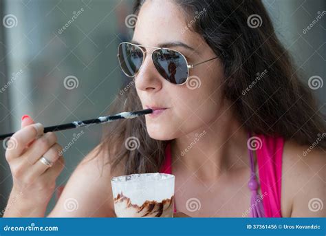 Pretty Brunette Drinking Ice Coffee Stock Photo Image Of Pink Girl