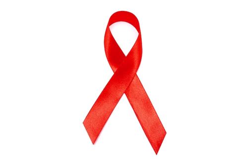 Premium Photo | Red ribbon as symbol of aids or hiv awareness isolated ...