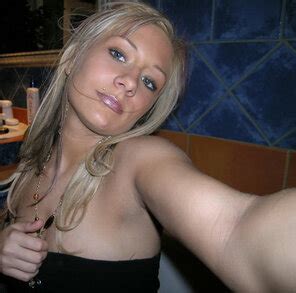 Nude Teen Exhibitionist Standing On A Crowded Public Street Porn Pic
