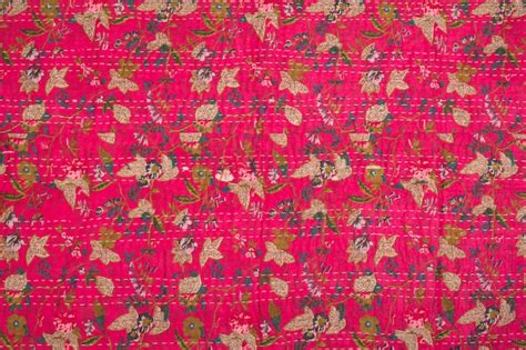 Premium Photo A Pink And Green Fabric With A Floral Pattern