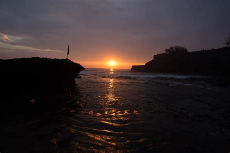 sunset over hindu temple Pura Tanah Lot, Bali, Indonesia 10383796 Stock ...