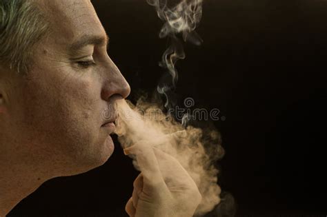 Man Smoking Cigarette On Black Background Handsome Young Man Smoking