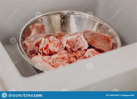 Uncooked Fresh Common Whelks Or Sea Snails Isolated On A White Studio