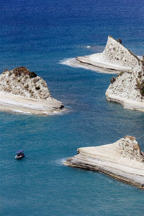 "Unique Rock Formations Of Sidari, Corfu, Greece. Small Boat In The Sea