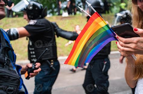 Hand Hold A Gay Lgbt Flag At LGBT Gay Pride Parade Festival Stock Photo At Vecteezy